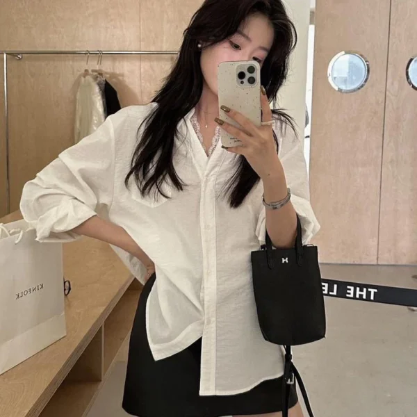 sg-11134201-7ren6-m2ulv0xtqiuz23.webp Autumn womens solid color Vneck lace shirt long sleeve loose version